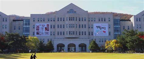A large building with banners in front of it

AI-generated content may be incorrect.