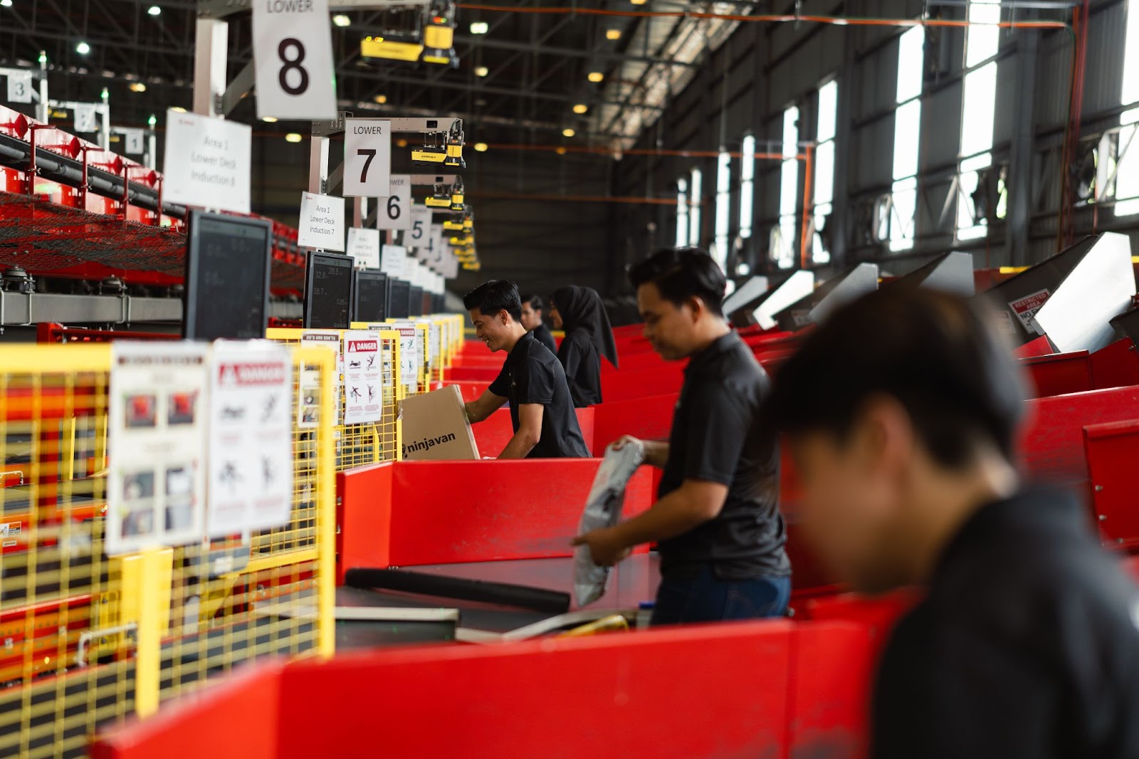 Fast-paced fulfillment process at Ninja Van, from picking to packing FMCG items.