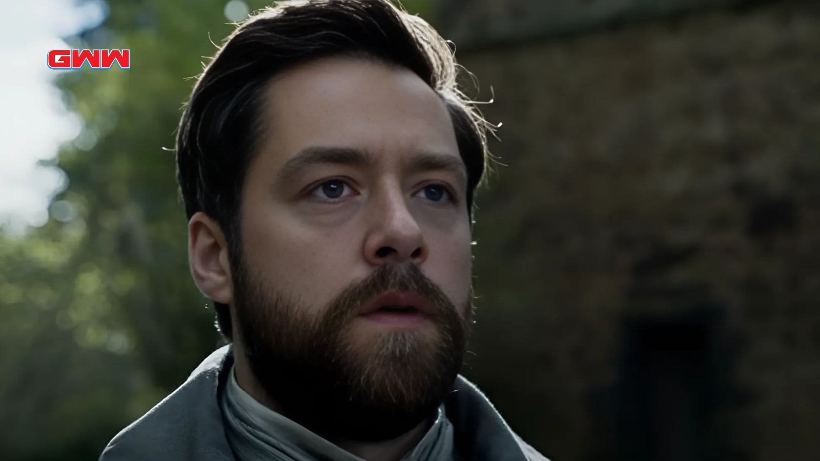 Richard Rankin as Roger MacKenzie looking concerned in Outlander Season 7