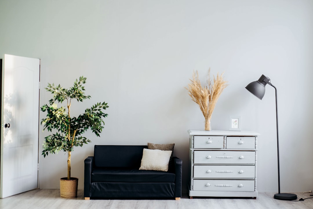 A programmable thermostat in a living room