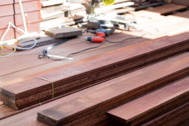 how tariffs will affect your home remodeling project decking boards stacked on top of deck build custom built michigan