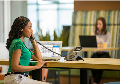 telecom offic with staff answering calls