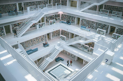 White library with staircases