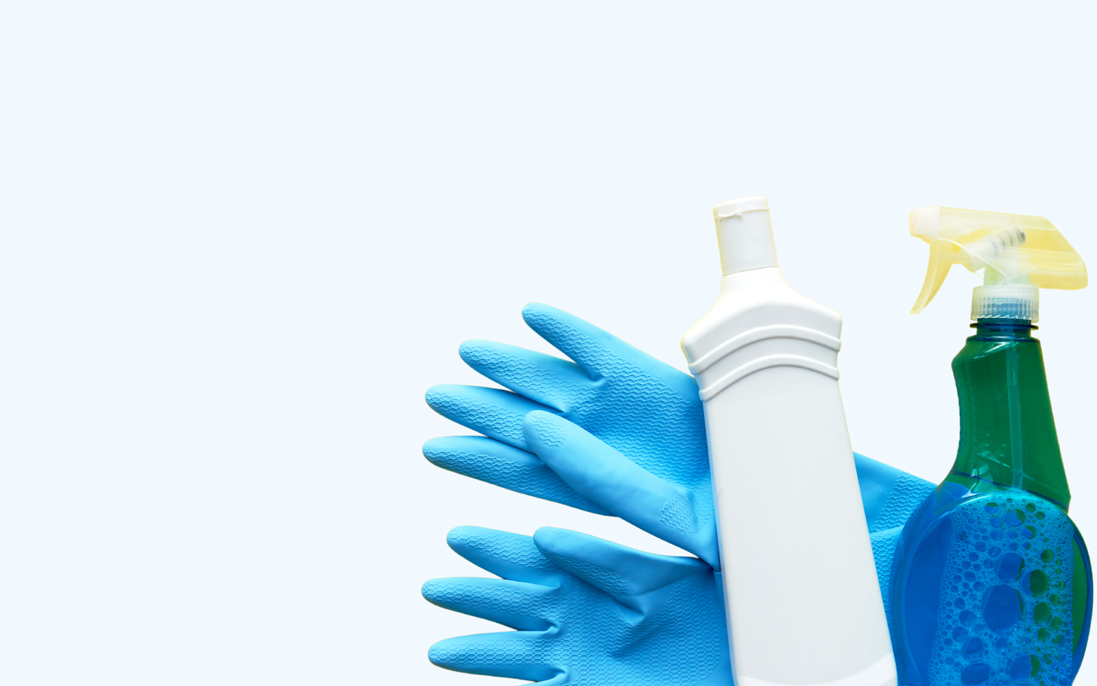 Blue cleaning gloves with spray bottle and detergent – essential supplies for cleaning a divan bed base
