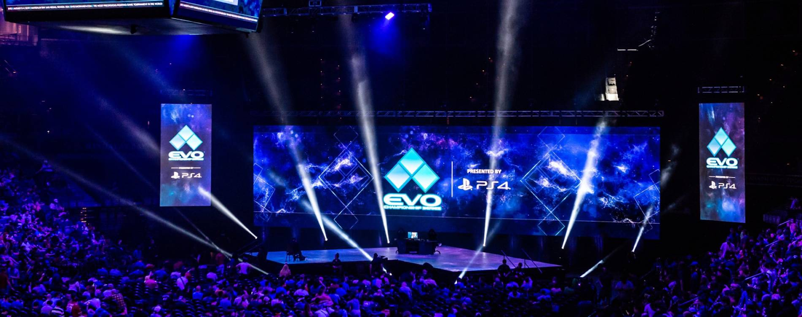 The stage in Evo event with a lot lighting and audience