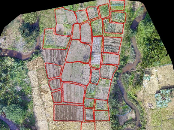 A aerial view of a farm

Description automatically generated