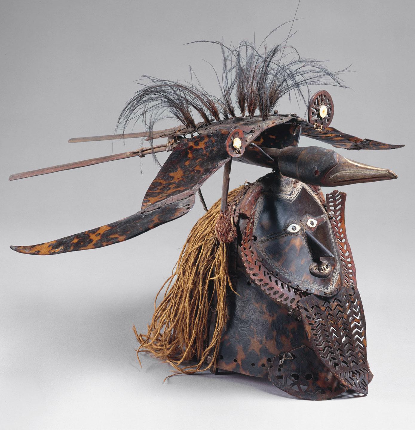 A mask made of metal

Description automatically generated